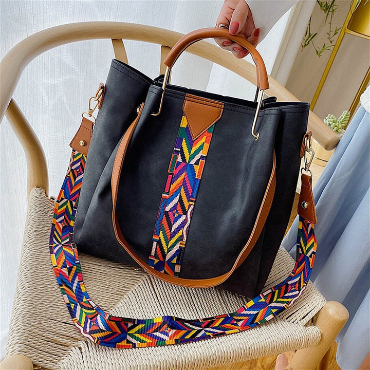 Spacious PU leather tote bag for women, perfect for everyday carry. Elegant shoulder bag design.