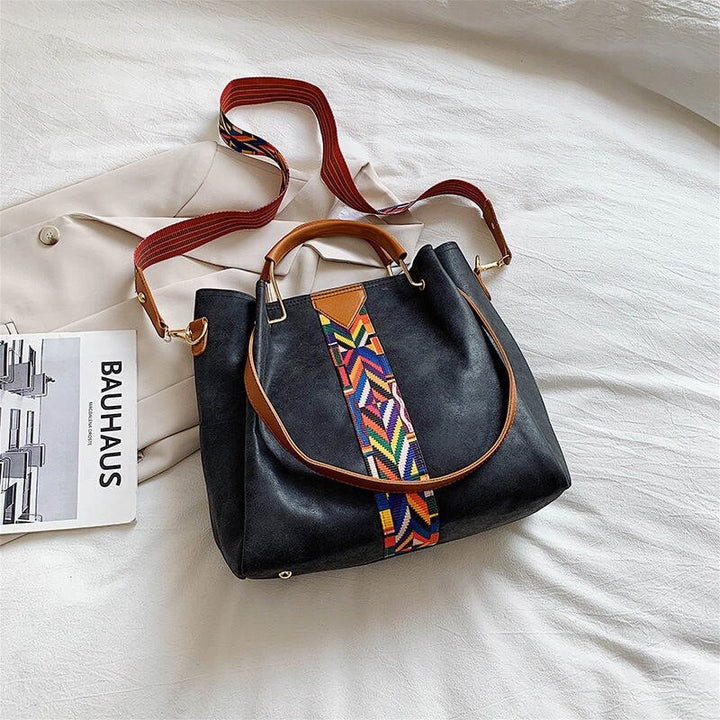 Practical spacious PU leather tote bag for women, ideal for daily use and everyday carry essentials.