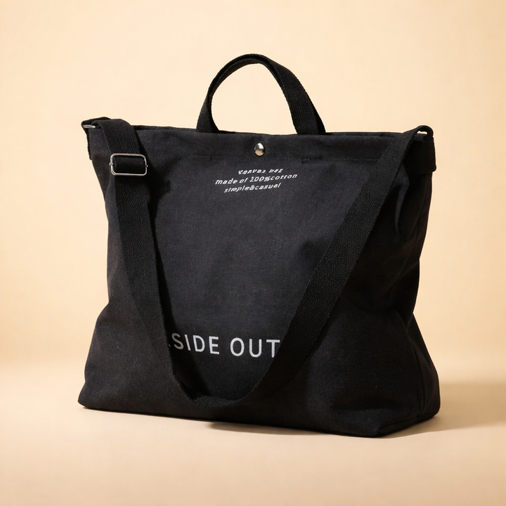 Army green large capacity canvas tote bag for women. Minimalist design, comfortable shoulder straps, ideal everyday handbag.