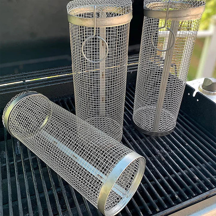 "Stainless steel BBQ rolling basket with mesh design for even grilling, shown with food; essential for outdoor cooking."