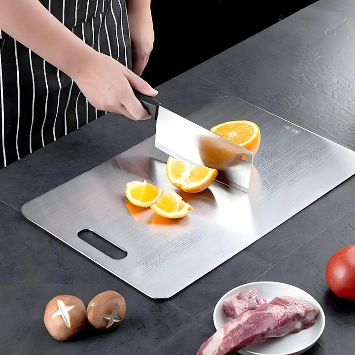 "Stainless steel cutting board, non-slip, scratch-resistant surface for hygienic food prep, sleek design for kitchen use."