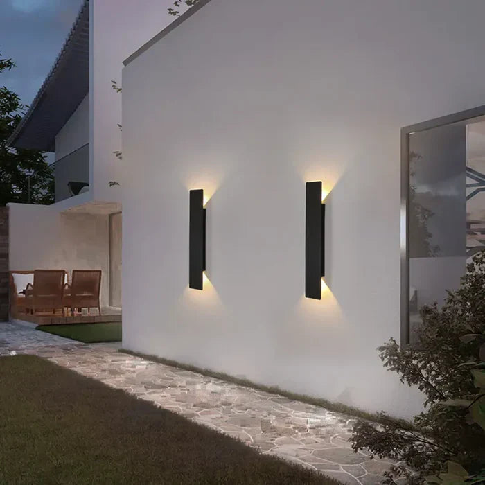 Modern architectural outdoor wall lamp, providing bright up-down lighting for secure and stylish home & garden exteriors.