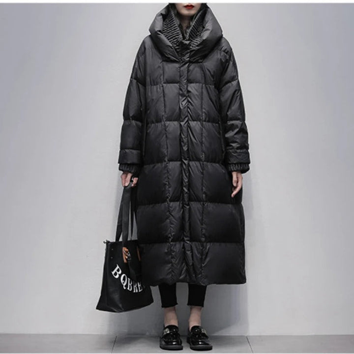 Stylish Amara women's long padded winter jacket. Quilted design offers warmth & comfort for cold weather.