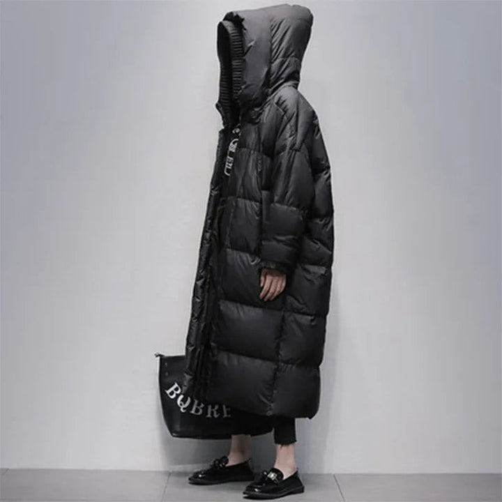 Elegant women's long quilted winter jacket. Padded for ultimate warmth & protection against cold weather.