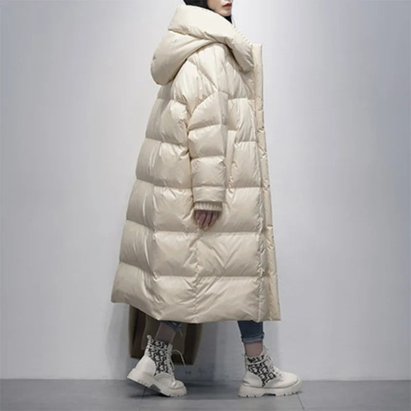 Amara women's long padded winter jacket, showcasing its warm, durable fabric and comfortable design.