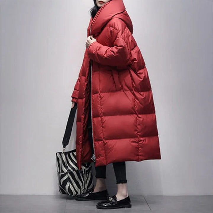 Versatile women's long padded winter coat, designed for everyday wear in cold weather conditions.
