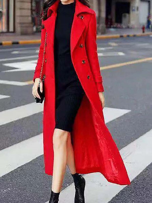 Modern Elora women's long winter coat, featuring a trendy shawl collar, prominent button detail, and adjustable waist belt.