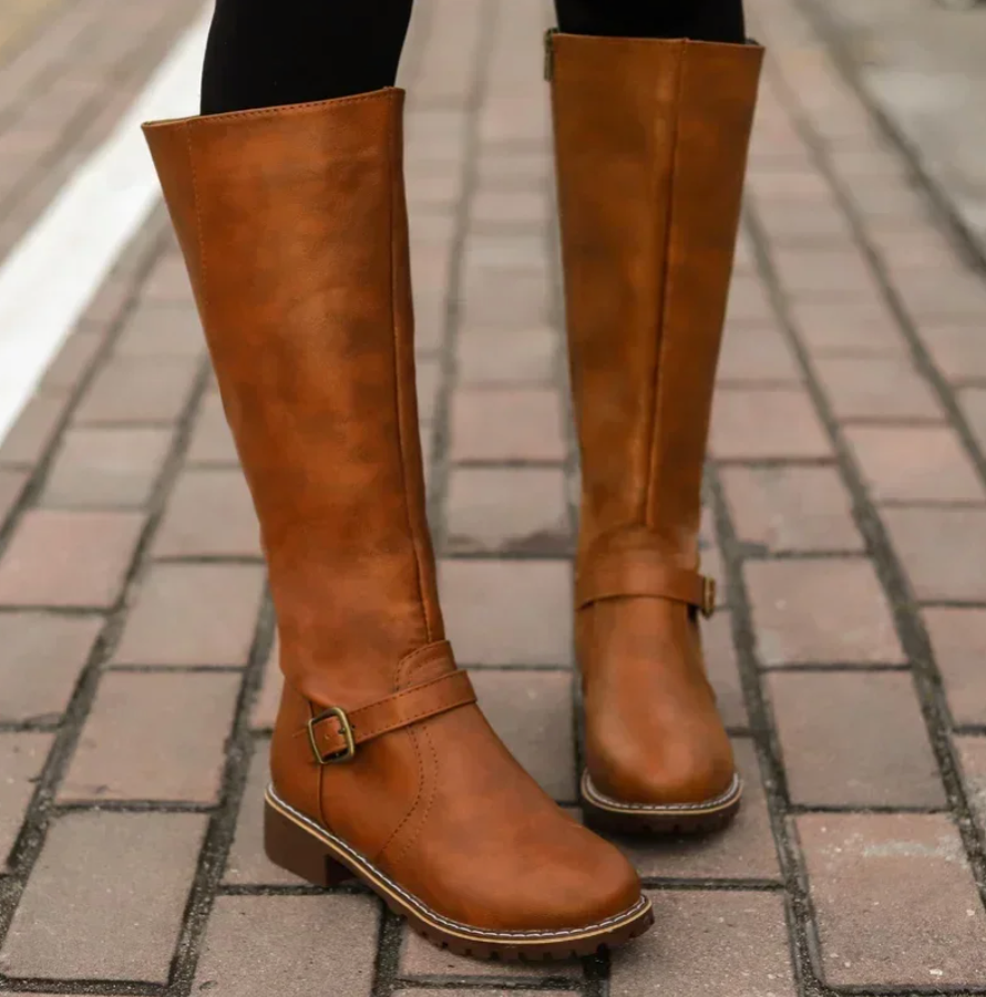 Stylish Emma women's ankle boots for all-weather comfort. Durable, non-slip, and shock-absorbing for everyday wear.