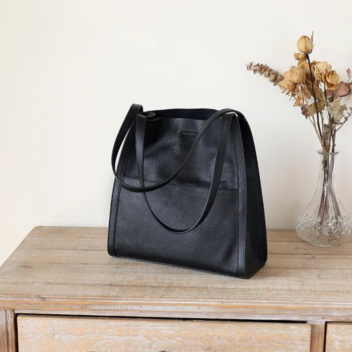 Versatile women's large faux leather tote for work, travel & everyday use.
