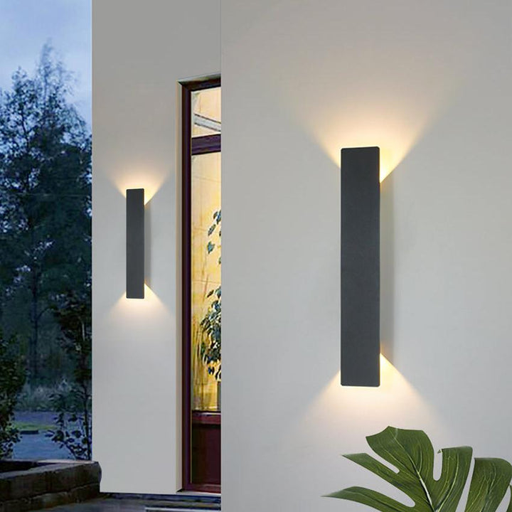 "Stylish outdoor waterproof LED wall light, rectangle design, up/down illumination, modern look, IP65 for durability."