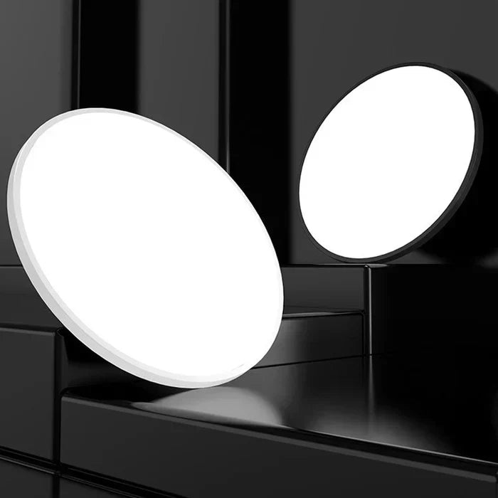 Round LED ceiling light fixture, contemporary design, perfect for modern home lighting.