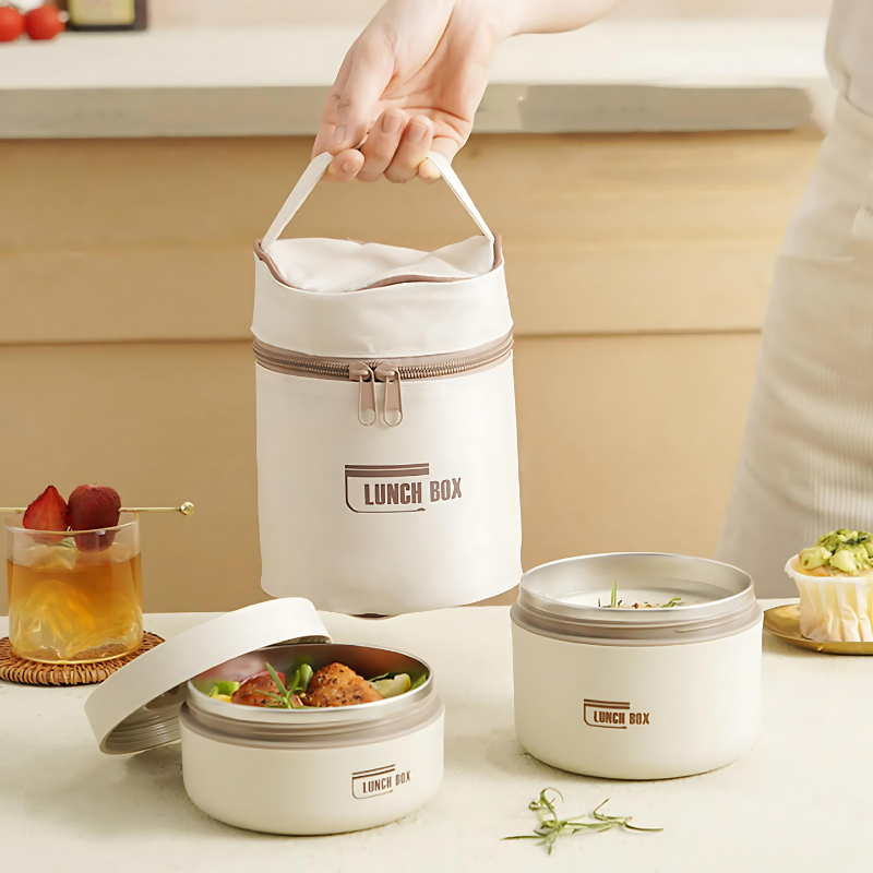 "Stylish stainless steel lunch box set with insulated bag, perfect for all ages, ensures meals stay warm and organized on-the