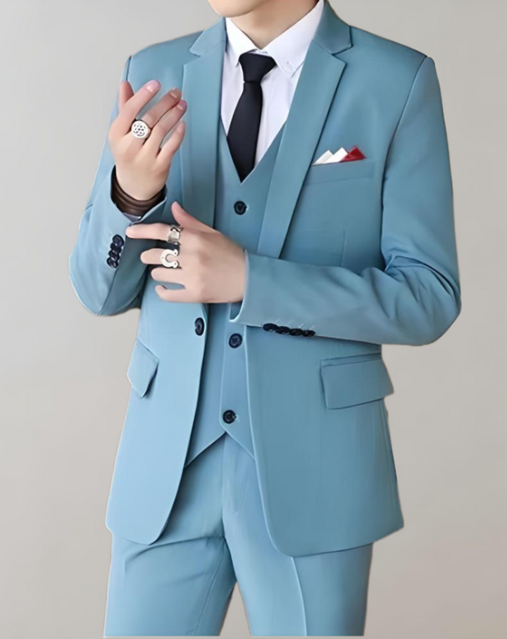 Man wearing a sharp Tobias 3-piece tailored suit, showcasing elegant formal wear for business or wedding.