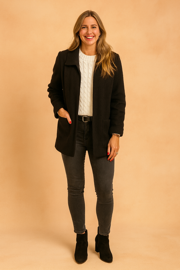 Contemporary women's cropped zip jacket featuring elegant pockets, offering a stylish outerwear option.
