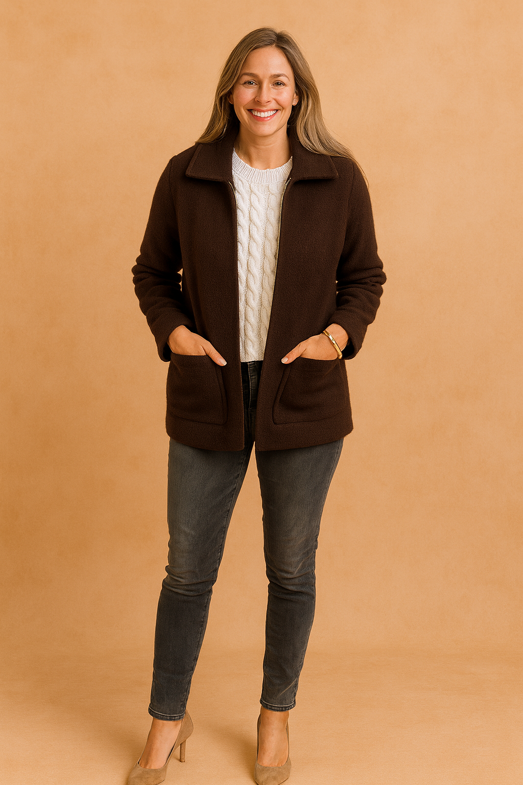 Casual yet chic women's cropped zip jacket with convenient pockets, designed for comfortable everyday fashion.