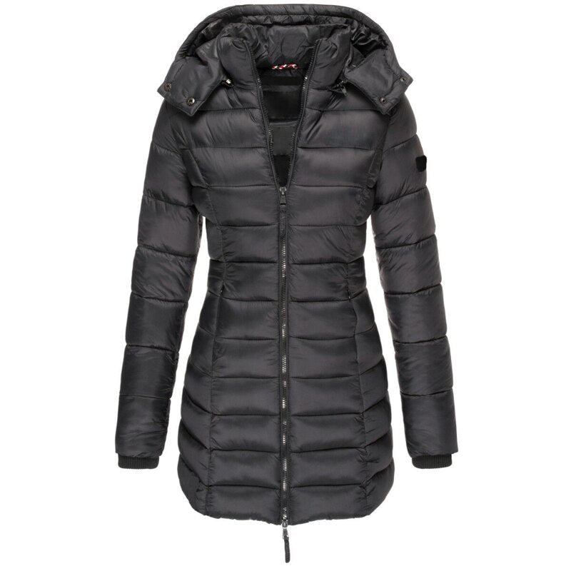 Close-up of a women's insulated puffer jacket with a warm hood. Detailed view of the stylish stitching & durable fabric.