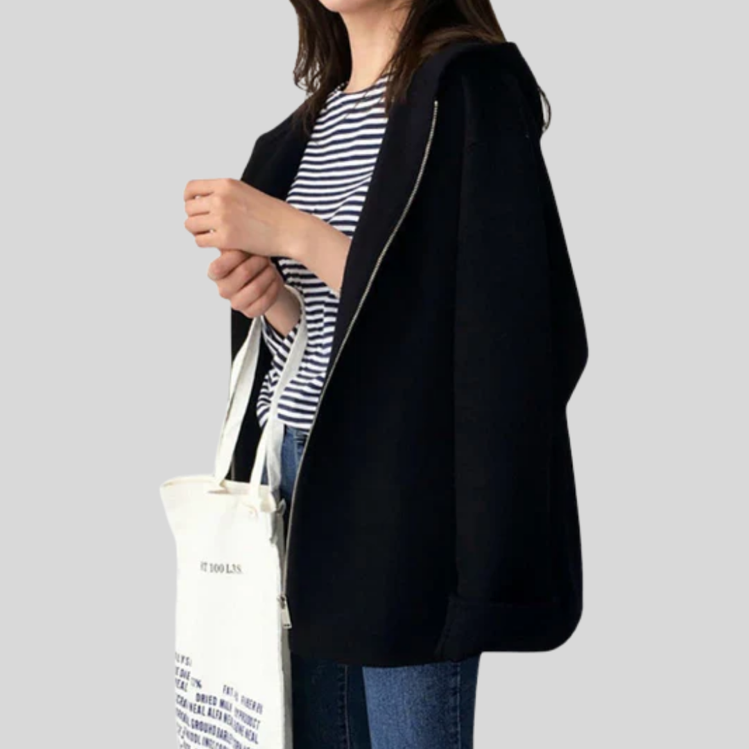 Stylish women's hooded zipper jacket in a versatile fall/spring design for casual everyday comfort and travel.
