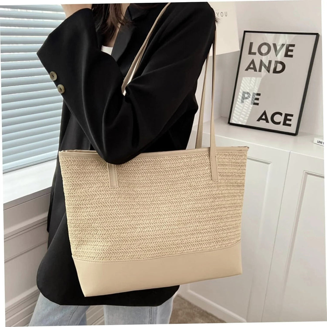 Large women's woven tote bag in beige, a stylish and casual shoulder bag for everyday use.