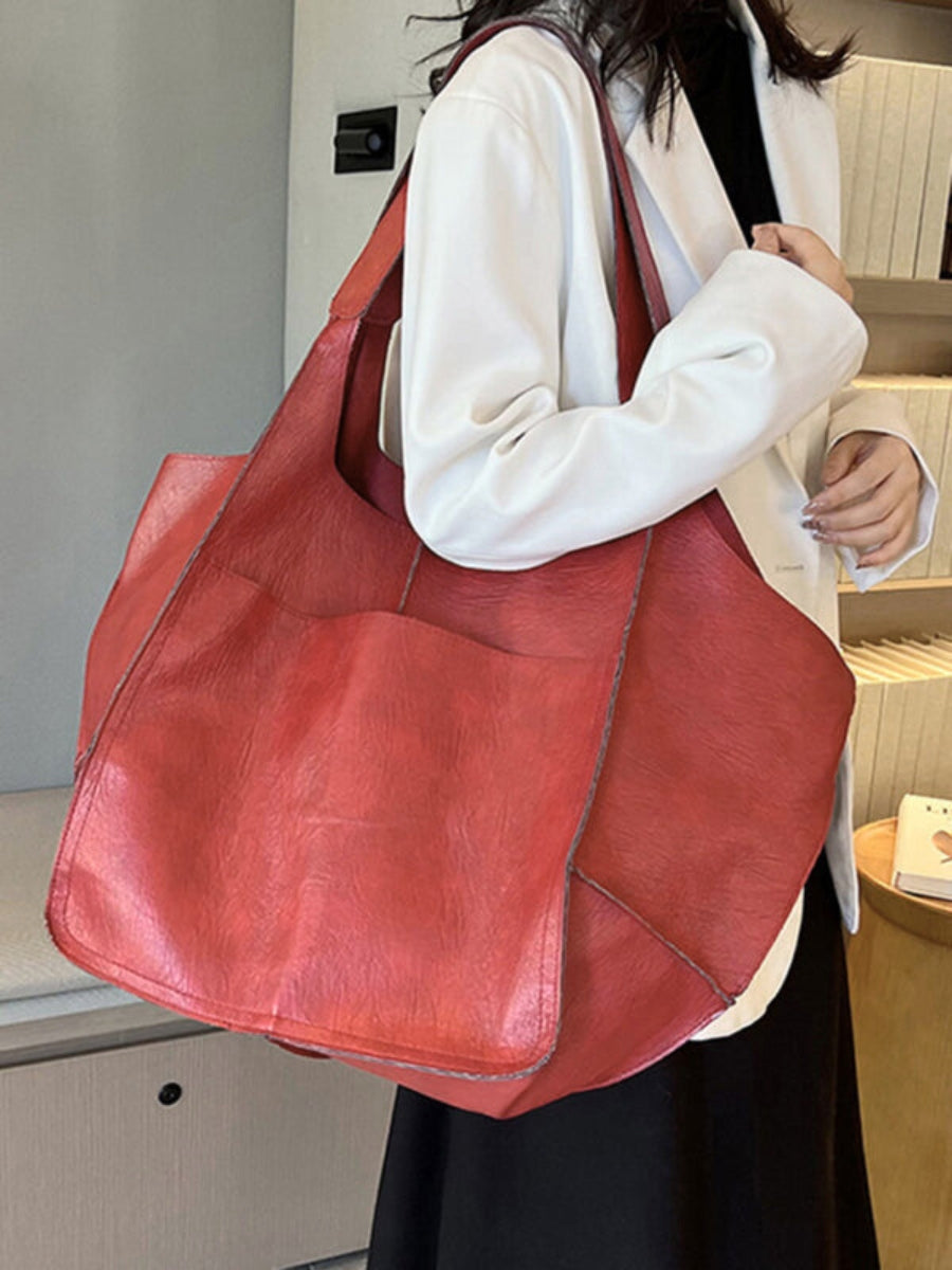 Stylish women's large shoulder tote bag, perfect for travel & everyday use, with spacious design.
