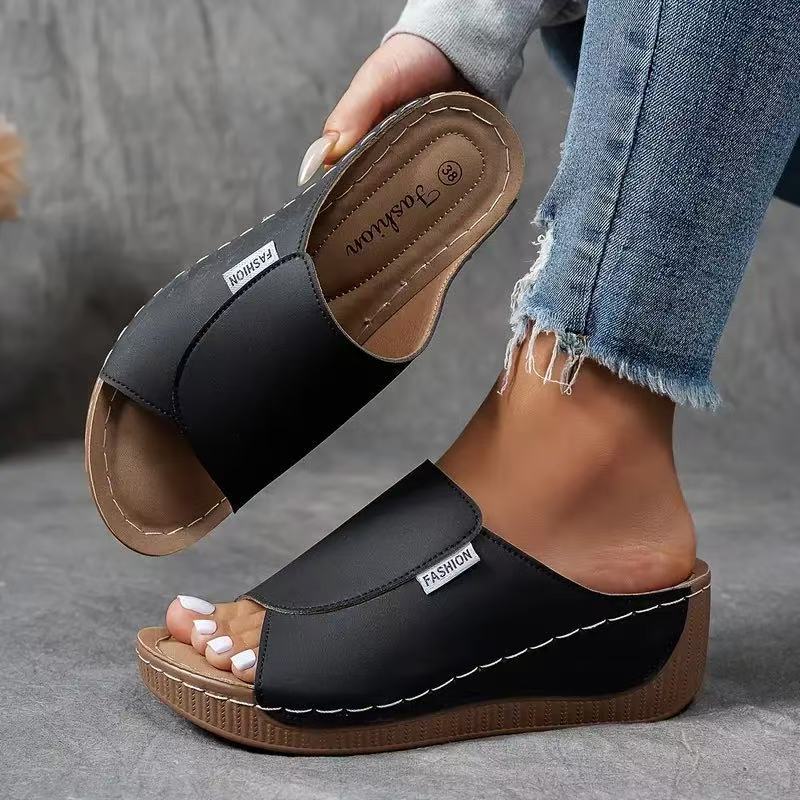 Everyday women's open-toe slip-on wedge sandals, offering comfort & style as essential summer footwear.