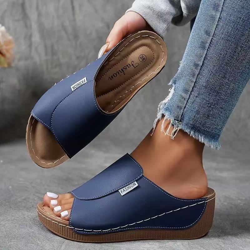 Versatile women's wedge sandals, open toe, slip-on style, ideal for summer outfits and comfortable walking.