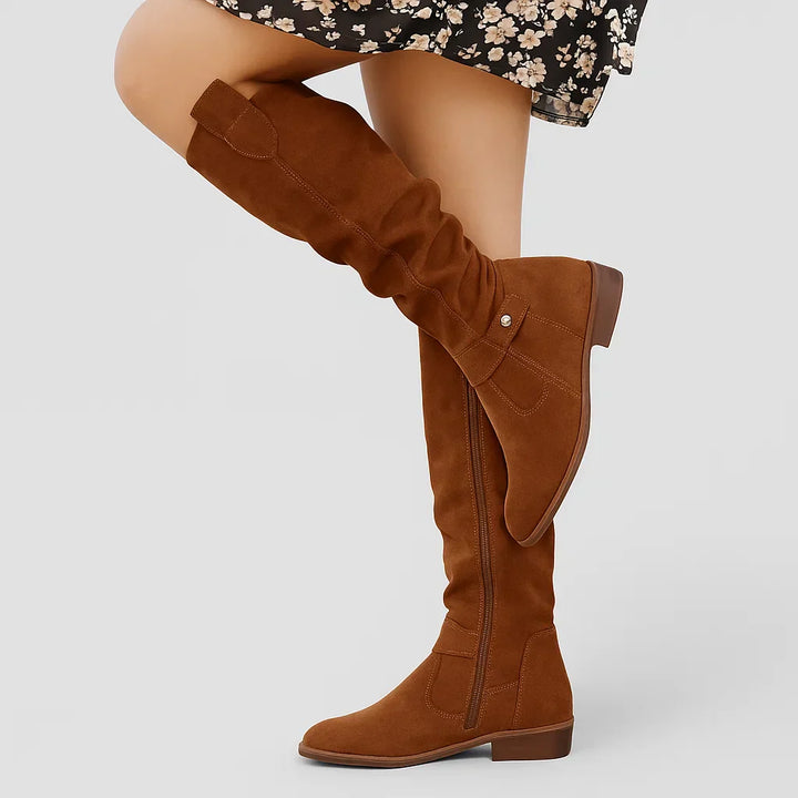 Elegant side view of women's orthopedic boots, featuring a supportive design & comfortable fit.