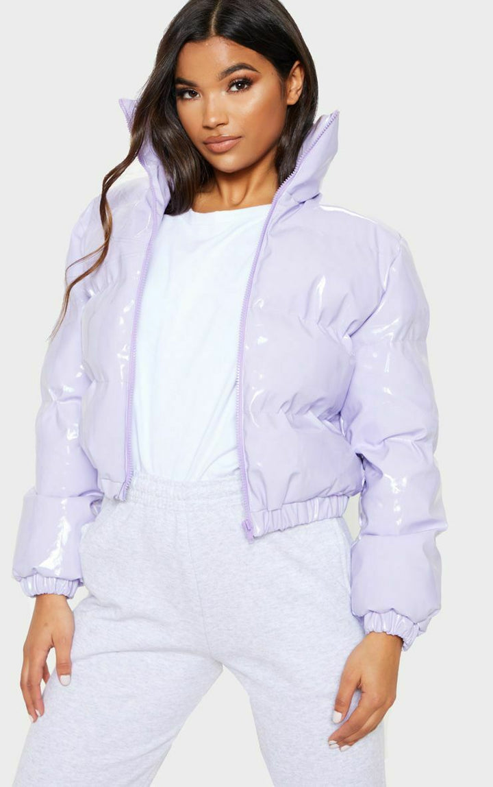 Trendy women's winter bomber, stylish insulated puffer jacket.