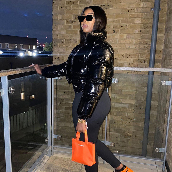 Fashionable women's puffer coat, warm bomber for winter outerwear.