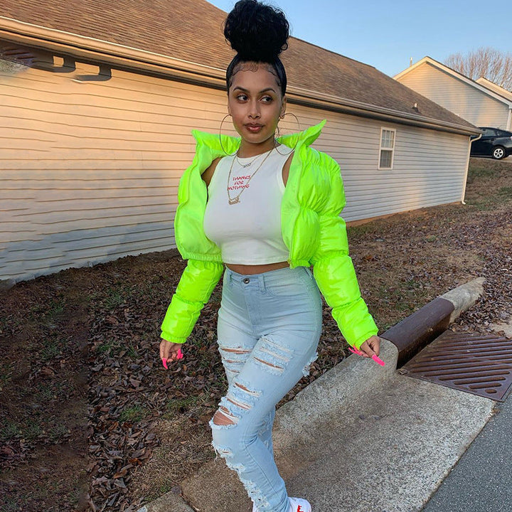 Trendy women's warm puffer bomber jacket, casual winter fashion.
