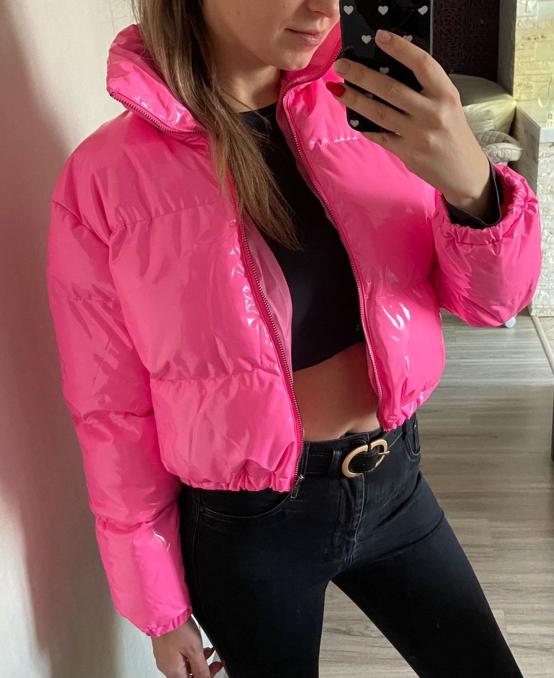 Fashionable women's winter coat, stylish puffer bomber for outerwear.