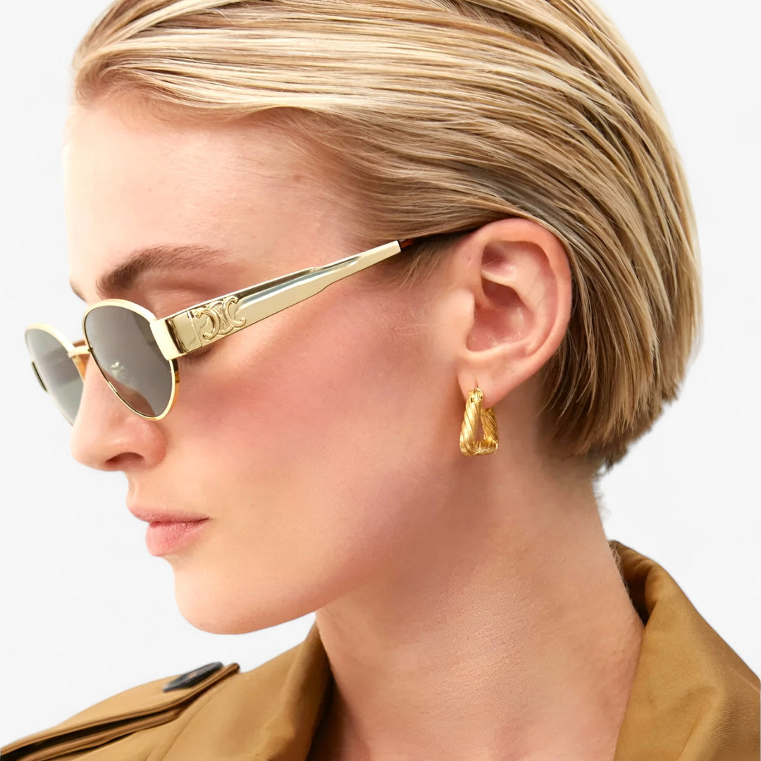 Stylish women's sunglasses with UV protection, featuring a chic acetate frame for summer fashion.