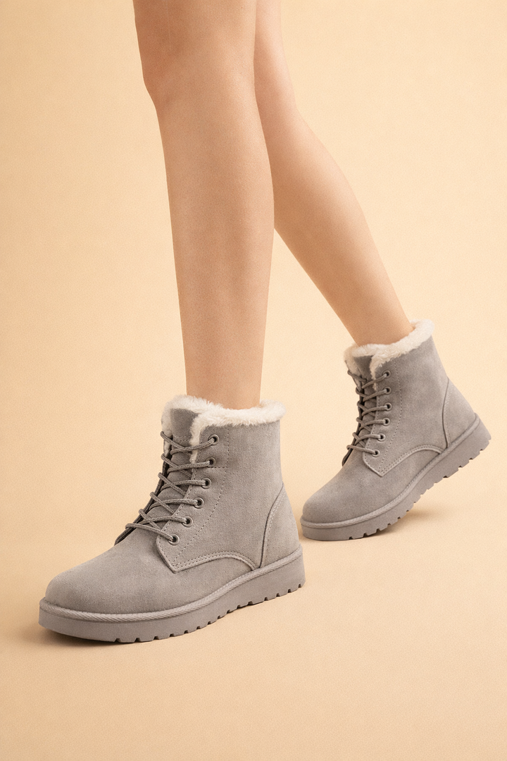 Plush women's winter boots with a cozy lining, offering warmth and stylish comfort for cold weather.