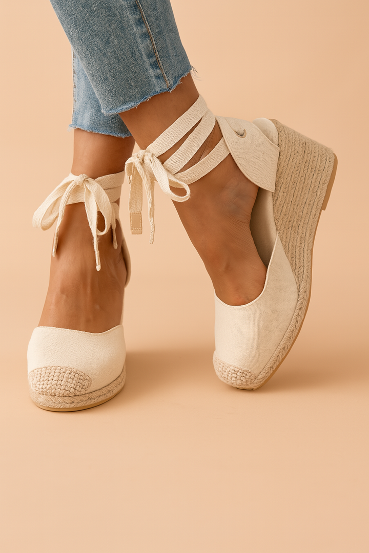 Stylish women's wedge espadrille sandals with elegant ankle ties, perfect for summer vacations & casual wear.