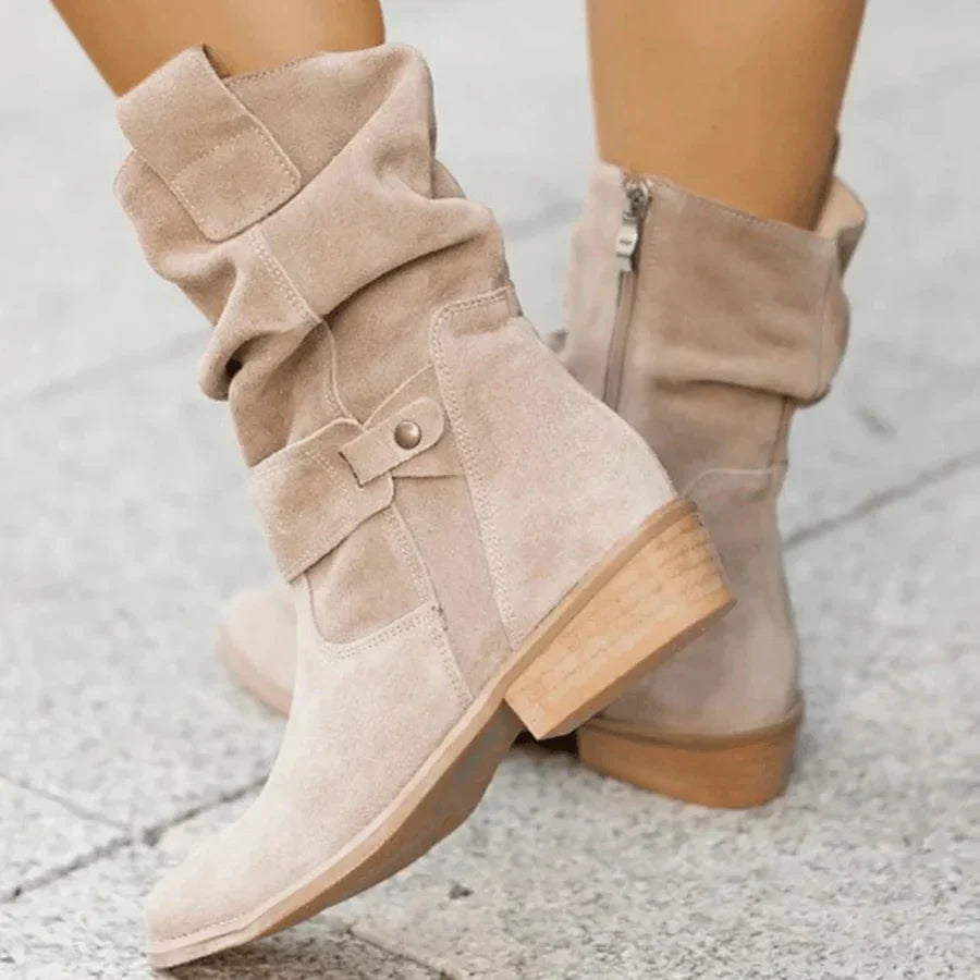 Elegant women's western buckle ankle boots with a practical side zip and comfortable low heel for versatile styling.