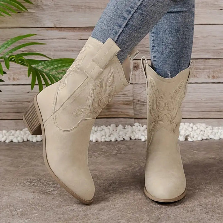 Embroidered women's Western cowgirl boots with a comfortable block heel. Chic mid-calf beige boots for everyday.