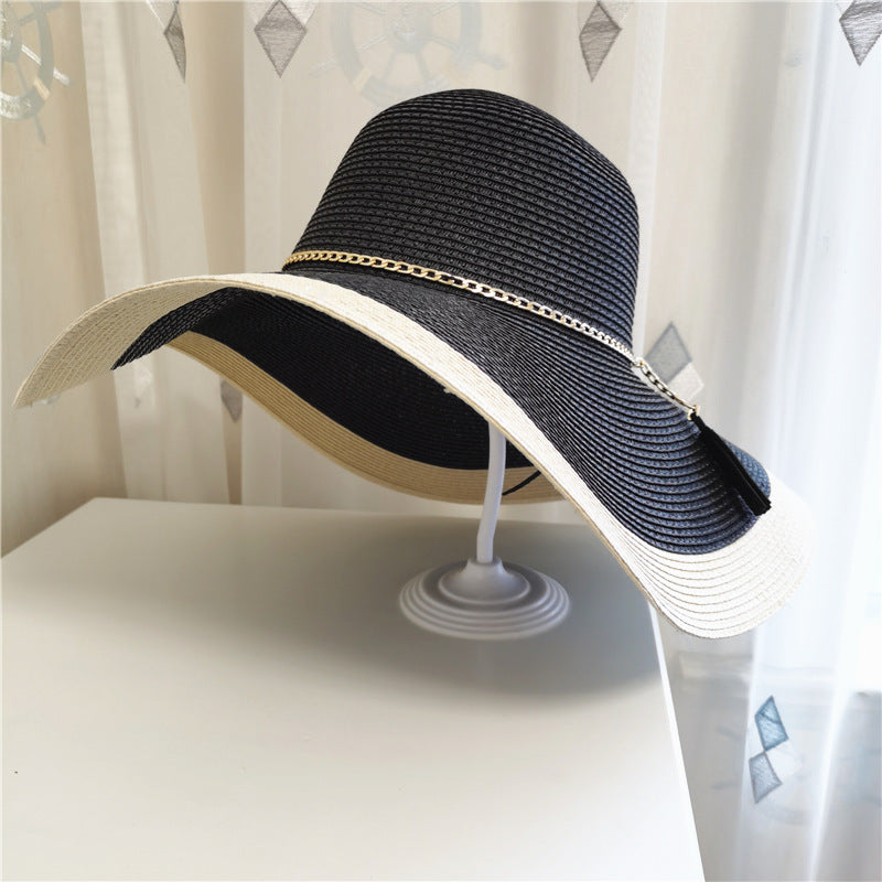 Elegant wide brim beach hat for women, providing stylish UV protection for all your summer outdoor activities.