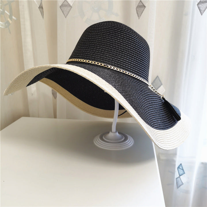 Elegant wide brim beach hat for women, providing stylish UV protection for all your summer outdoor activities.