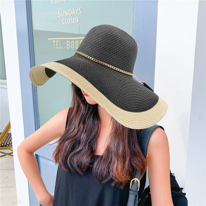 Breathable wide brim sun hat for women, ideal travel accessory for sunny days and UV protection.