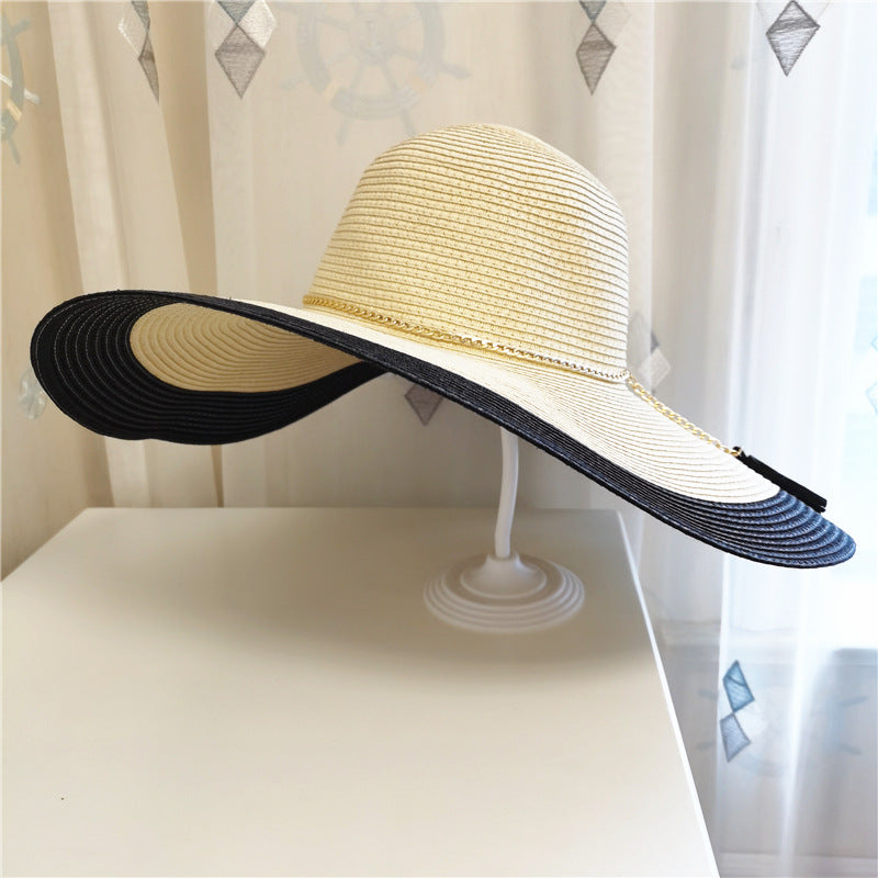 Versatile women's wide brim sun hat, perfect for UV protection during summer beach trips and outdoor adventures.