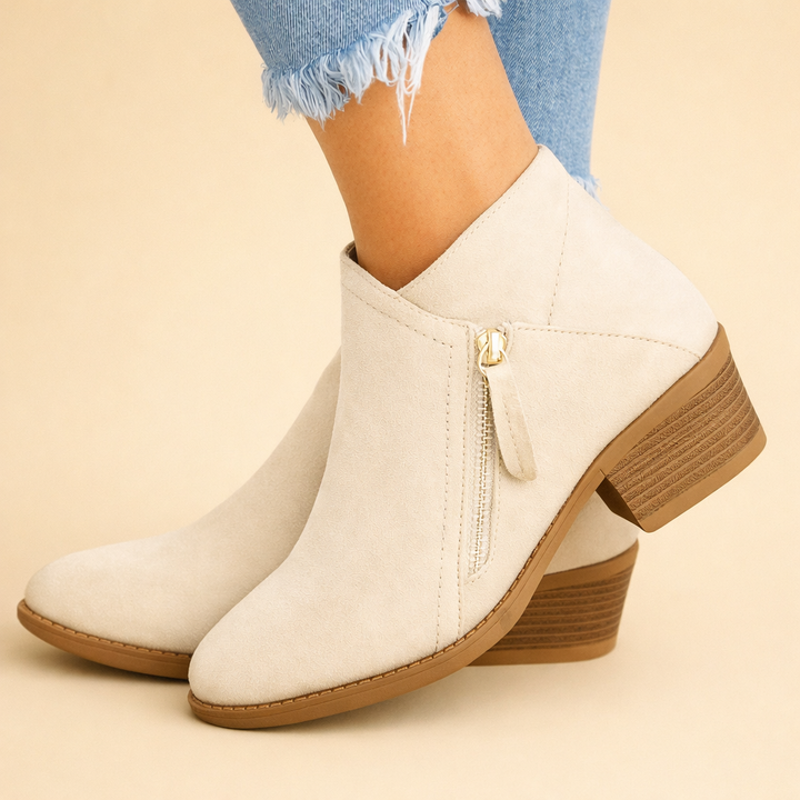Comfortable women's ankle boots with zipper closure. Essential stylish footwear for fall fashion & casual wear.