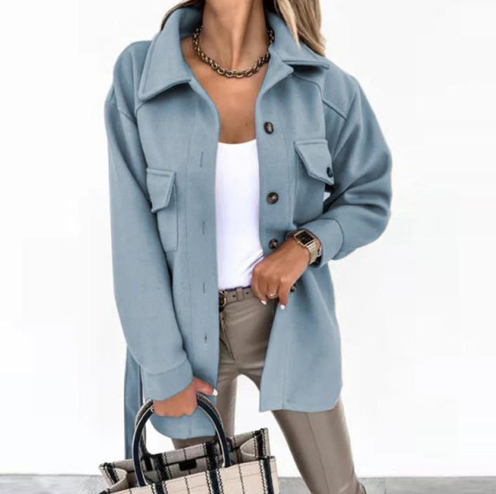 "Stylish women's mid-season jacket with slim fit, zip closure, in spring shades enhancing a chic and modern silhouette."