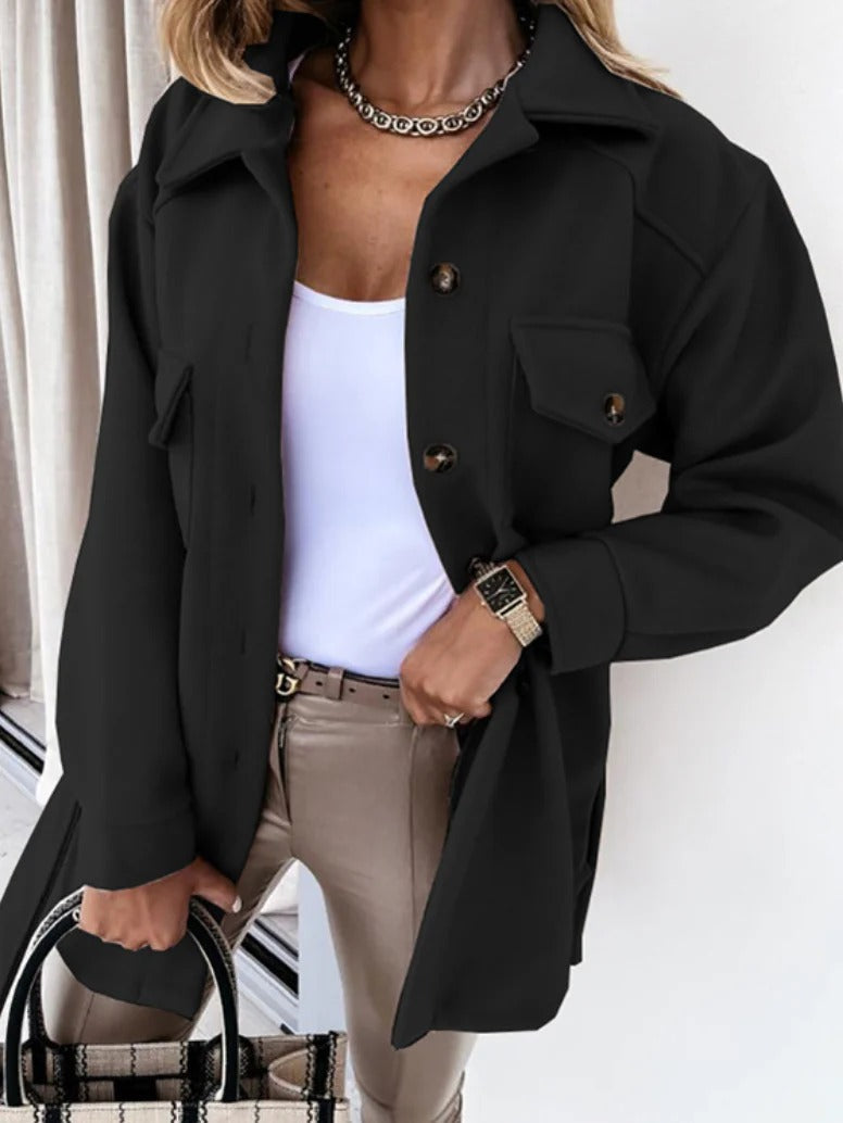 "Stylish women's mid-season jacket with slim fit, zip closure, in spring shades enhancing a chic and modern silhouette."