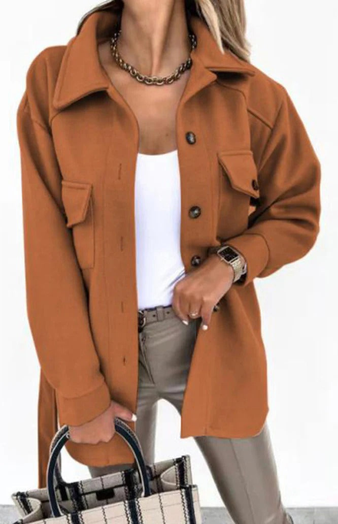 "Stylish women's mid-season jacket with slim fit, zip closure, in spring shades enhancing a chic and modern silhouette."