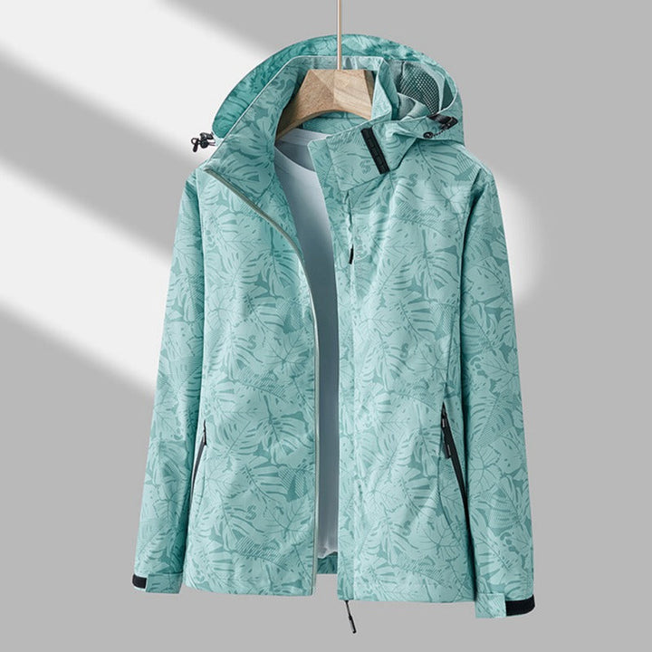 Stylish women's waterproof windproof hooded jacket, lightweight design, adjustable hood, and practical pockets in various col