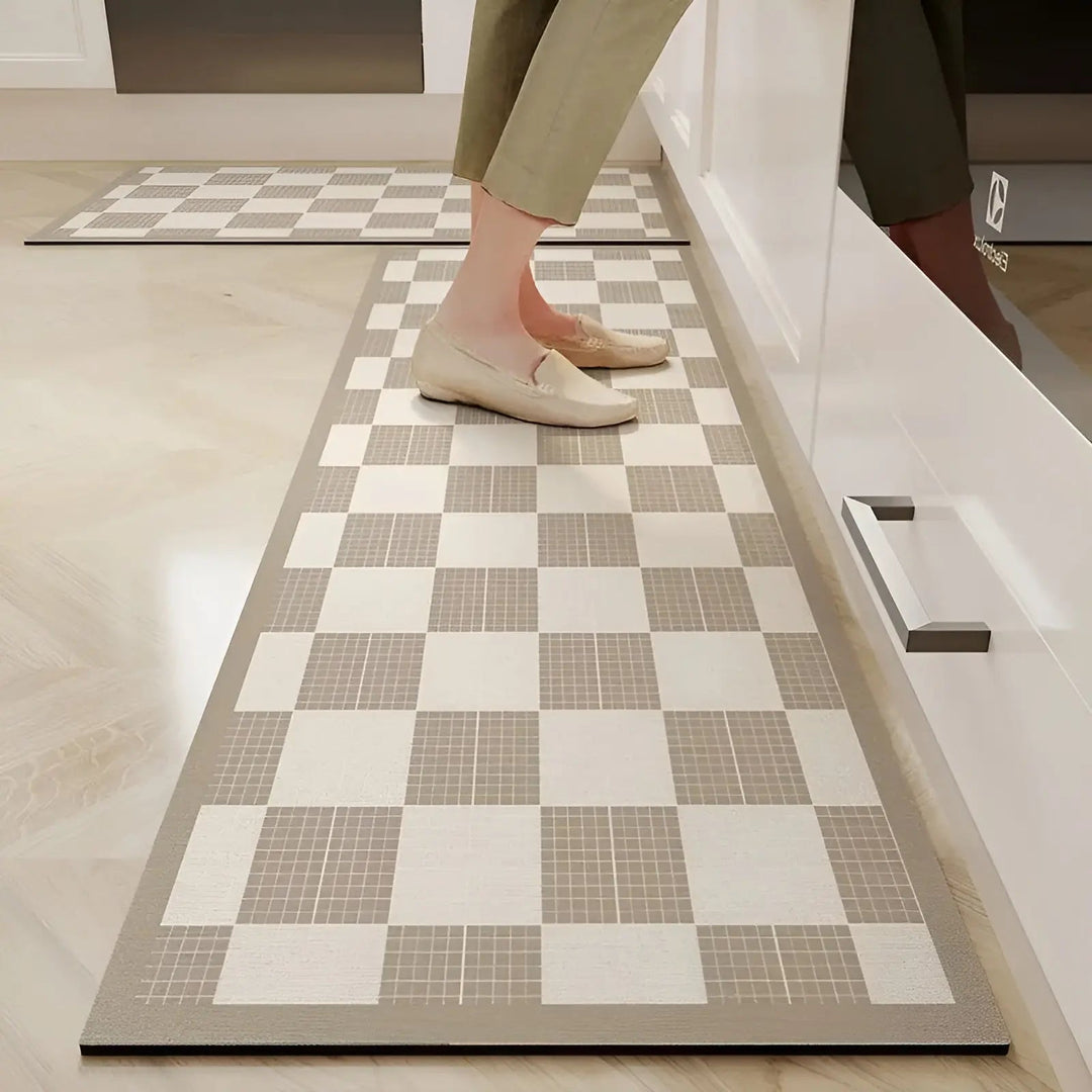 Easy clean PVC kitchen mat. Ultra-absorbent & non-slip for busy kitchens, providing floor protection & comfort underfoot.