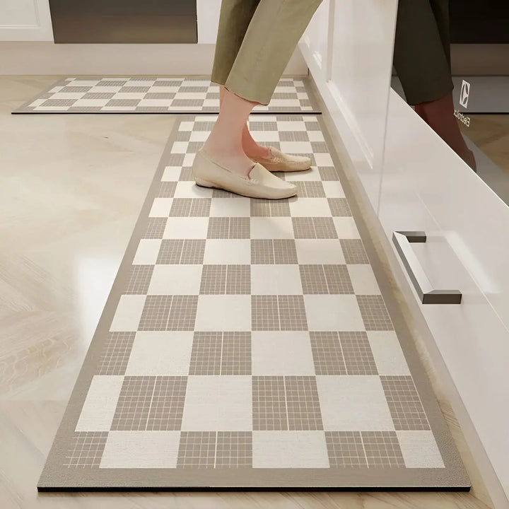 Easy clean PVC kitchen mat. Ultra-absorbent & non-slip for busy kitchens, providing floor protection & comfort underfoot.