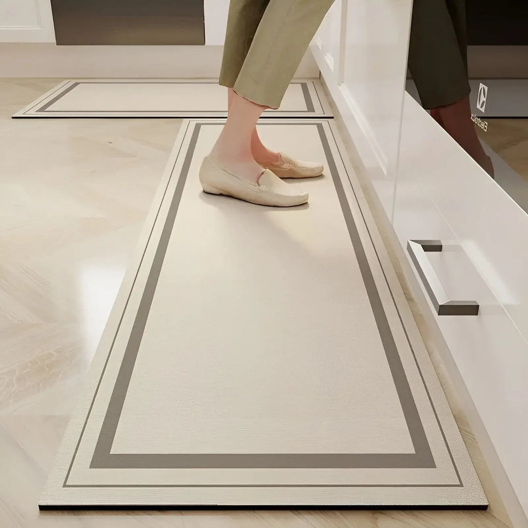 Comfort-focused modern kitchen mat. Ultra-absorbent, non-slip PVC floor protector for home decor & easy cleaning.