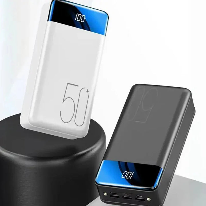 Ultra capacity 50K mAh power bank with versatile use, shown in sleek design and compact size for portable charging needs.