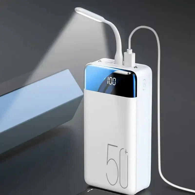 Ultra capacity 50K mAh power bank with versatile use, shown in sleek design and compact size for portable charging needs.