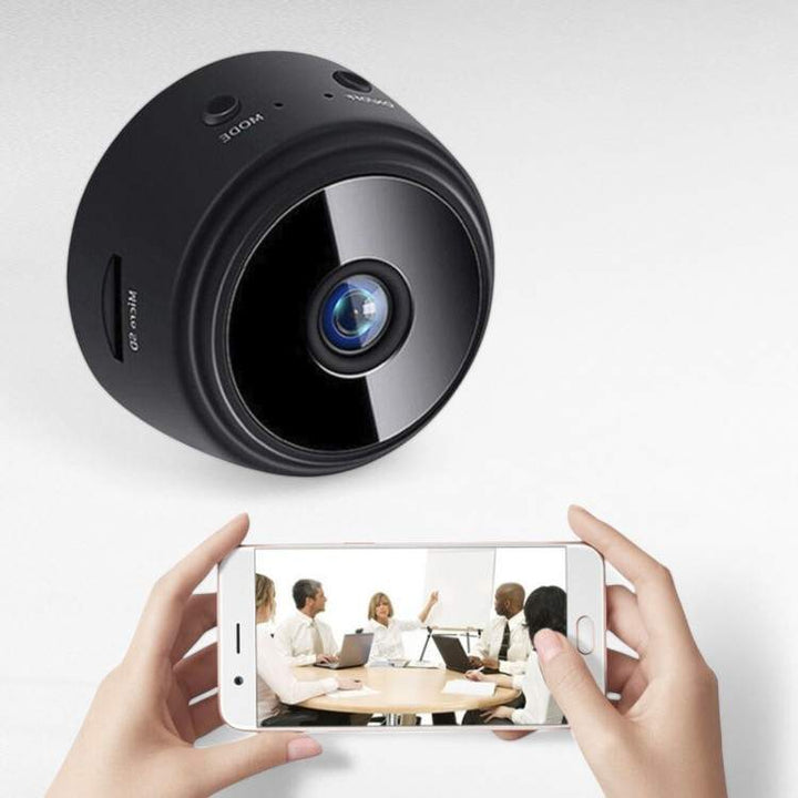Ultra-Compact HD Security Camera with night vision, sleek mini design, 1080p resolution, 150° wide-angle, infrared LEDs.
